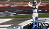 Check it out! Larson celebrates history-making win at Charlotte