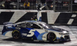 Check it out! Larson celebrates history-making win at Charlotte