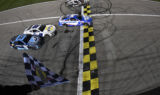 Larson wins Kansas in photo finish