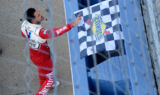 Cue the guitar solo! Check out Larson celebrating his Nasvhille win