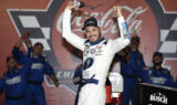 Check it out! Larson celebrates history-making win at Charlotte