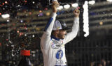 Check it out! Larson celebrates history-making win at Charlotte